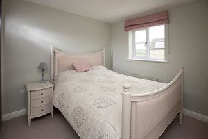 Bedroom One- click for photo gallery